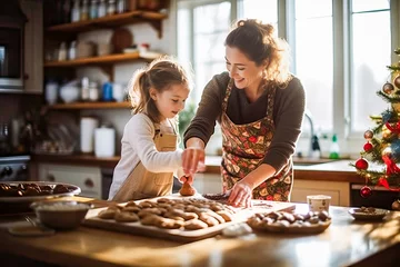 Foto op Aluminium A woman and a little girl baking Christmas cookies together © Nedrofly