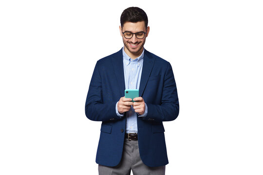 Happy Smiling Young Businessman Wearing Blue Suit, Looking At Phone Screen, Chatting Online, Surfing The Internet