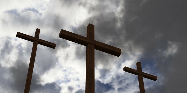 Three Jesus Christ christian crucifixes or crosses in front of stormy sky with dark clouds, god, resurrection or christianity concept