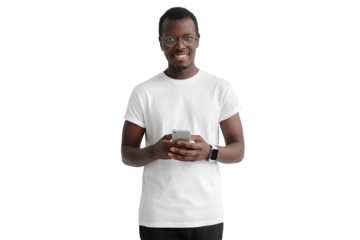 African american man standing, looking at camera, holding phone, surfing web and smiling while browsing content