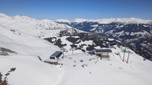 Aerial view of skiers on ski slopes in Horberg area, Mayrhofen ski, Tyrol, Austria.
