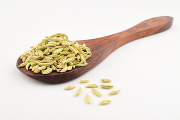 Closeup of fennel seeds on white background