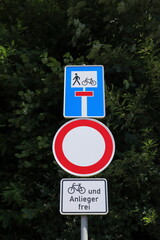 Several traffic signs prohibit passage with the inscription
"Residents only"
