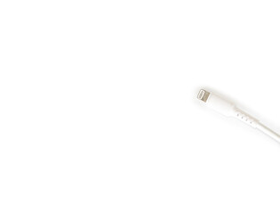 White charging adapter and cable on a white background