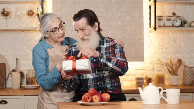 couples eating and enjoying new year together with gifts drinks