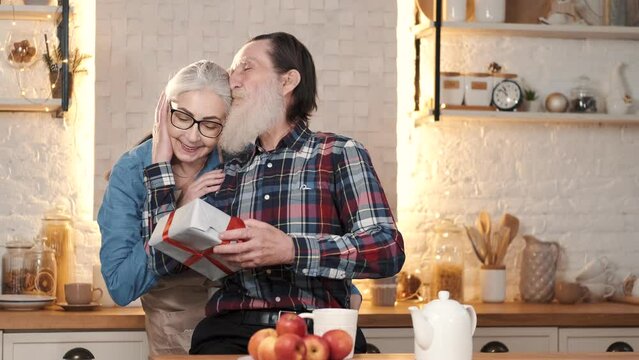 couples eating and enjoying new year together with gifts drinks