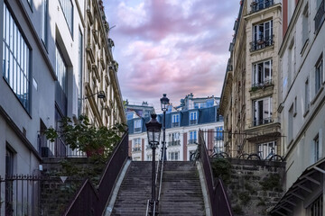 Paris, romantic staircase in Montmartre, typical buildings and floor lamp
