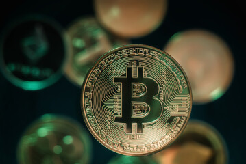 Physical coin Bitcoin top view. BTC against the backdrop of cryptocurrencies.
Bitcoin close up.