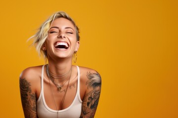 Young woman with neck and face tattoos happy smiling laughing - obrazy, fototapety, plakaty