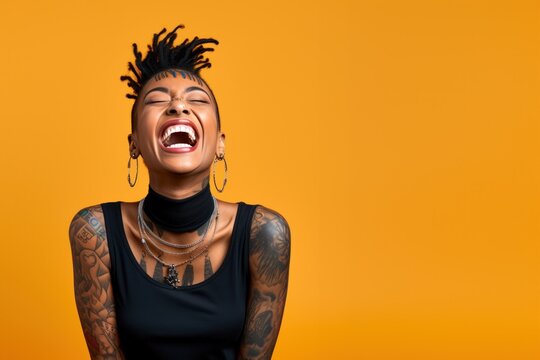Young woman with neck and face tattoos happy smiling laughing