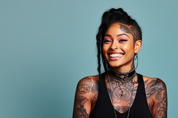 Young woman with neck and face tattoos happy smiling laughing - Powered by Adobe