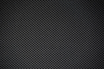Close up of a mesh fabric, showcasing its texture.