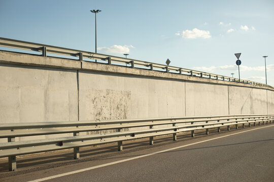 Bump stop near highway. Wall on highway. Strassa exit.
