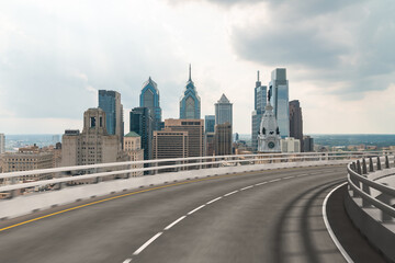 Empty urban asphalt road exterior with city buildings background. New modern highway concrete...