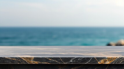 Close-Up of a Black and Gold Marble Table with an Ocean Blurry Background, Ideal for Product Placement Concepts in Elegant Interior Design with a Relaxing Ocean View
