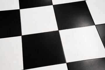 Checkered black and white tiles.