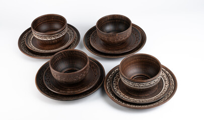 Clay cups. Pottery on white background