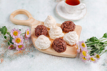 Delicious homemade meringue cookies with coconut flakes.