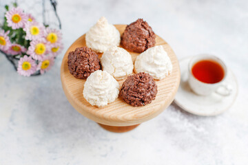 Delicious homemade meringue cookies with coconut flakes.