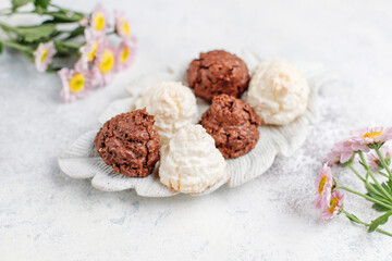 Delicious homemade meringue cookies with coconut flakes.