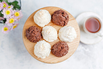 Delicious homemade meringue cookies with coconut flakes.