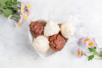 Delicious homemade meringue cookies with coconut flakes.