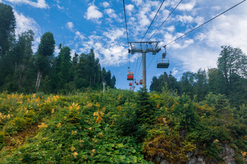 Cable car cabins in the mountains, mountain carousel lift, selective focus