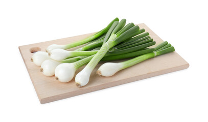 Whole green spring onions isolated on white