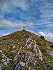 Wood cross on a mountain veto on Lake Como