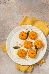 pumpkin shaped gnocchi with brown butter parmesan sauce