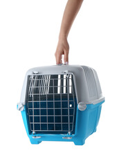 Woman holding light blue pet carrier on white background, closeup