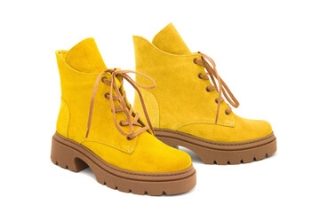 Fashionable suede leather boots isolated on white background. 