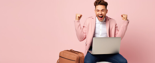 Joyful surprised man sitting with laptop on his lap in winning pose isolated on flat pastel background with copy space. Online giveaway banner template. 