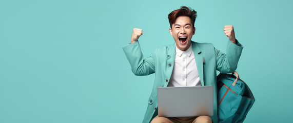 Joyful surprised man sitting with laptop on his lap in winning pose isolated on flat pastel...