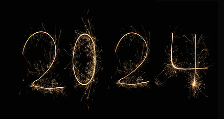 New Year 2024 text handmade written sparkles fireworks. Beautiful Shiny Golden numbers 2024...