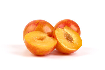 Fresh Aprium fruits, orange apricots, isolated on white background.
