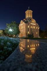Ancient ukrainian Pyatnytska church and reflection