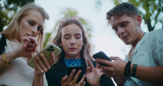 Young man and women using smart phones