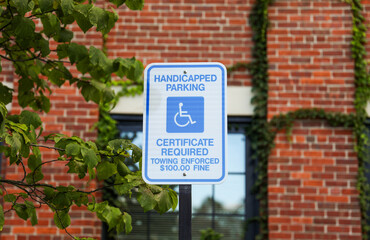 wheelchair accessibility sign against a modern cityscape, conveying equality and mobility for all