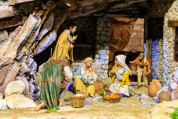 Christmas Nativity Scene. Intricately crafted nativity scene with figurines depicting the birth of...