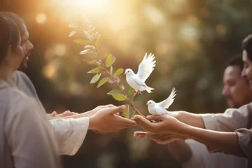 Fototapeten A essence of International Day of Peace with diverse people holding white doves or olive branches against a peaceful background. Generative Ai © bluebeat76