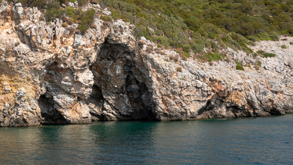 Fototapeta premium The sea cave located in Demircili bay between the Urla-Seferihisar coast of Izmir, Turkey