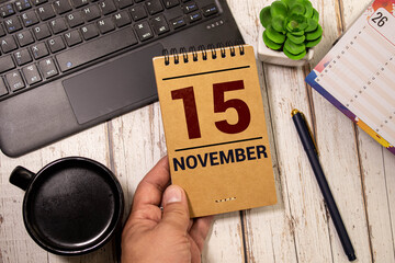 15 November on wooden grey cubes. Calendar cube date 15 November. Concept of date.