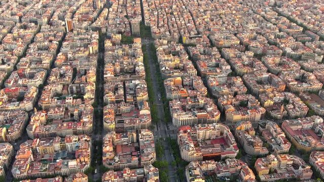Aerial view of Passeig de Gracia, one of the major avenues in Barcelona, on a summer morning at sunrise. Catalonia, Spain