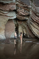 Fototapeta na wymiar pregnant couple on the beach