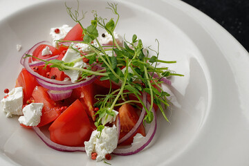 fresh tomato feta salad with spring greens and microgreens