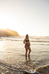 pregnant woman in the beach