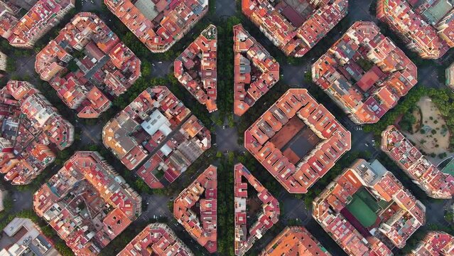 Aerial view of typical buildings of Barcelona cityscape. Eixample residential famous urban grid. Catalonia, Spain