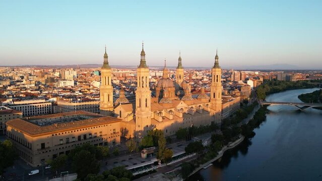 Aerial view of the Cathedral-Basilica of Our Lady of the Pillar in the city of Zaragoza, Aragon, Spain, sunrise golden hour