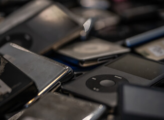 Piles of MP3 Players iPods Pile of Old MP3 Player Macro Close Up Assorted - obrazy, fototapety, plakaty